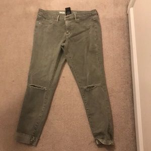 Green ripped skinny jeans